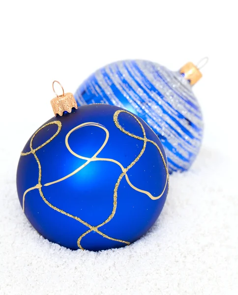 Blue Chritsmas Balls lying on snow — Stock Photo, Image