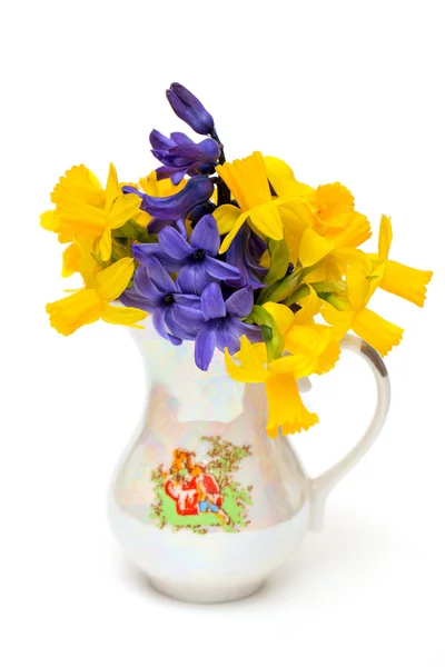 Hyacinth and narcissus flowers in vase — Stock Photo, Image