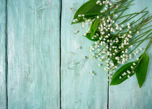 Bouquet Lillies Valley Turquoise Wooden Surface Top View — Fotografia de Stock