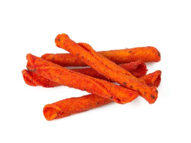 Pile of spicy corn chips isolated on white background. Hot rolled chips.