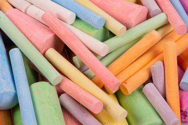 colorful pieces of chalk isolated on white background