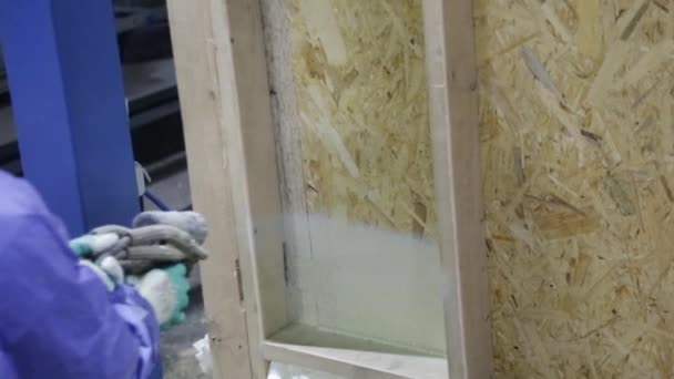 Builder Apply Insulation Foam Wall Wooden House — Stock Video