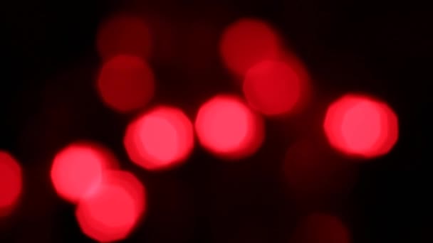 Muchas Luces Bokeh Rojas Sobre Fondo Negro — Vídeo de stock