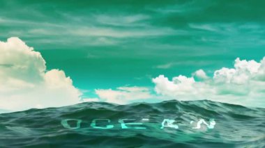 The inscription OCEAN in sea water on a sunny day
