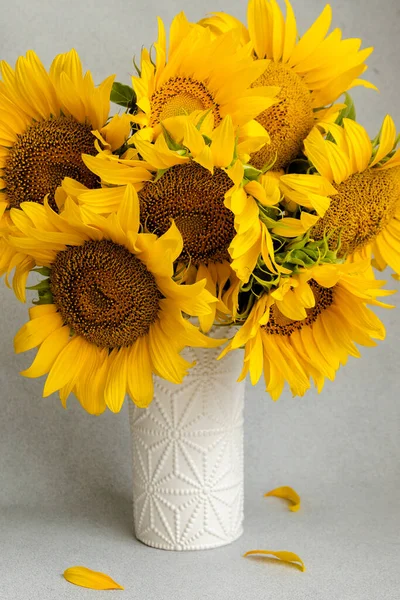 Sunflowers on the table. Sunflowers. Sunflowers on the white background