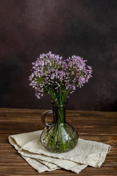 Bouquet in the vase on the table. Flowers in a vase. Summer bouquet. Wildflowers