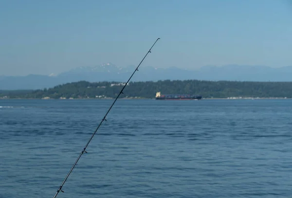 Fishing Rod Laying Rail Edmonds Phishing Pier Cargo Ship Background — ストック写真