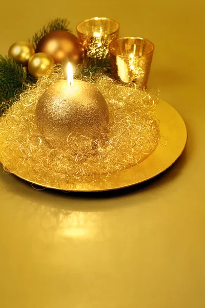 Golden Christmas candle. Still life. — Stock Photo, Image