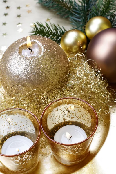 Burning Christmas candle, still life. Stock Image