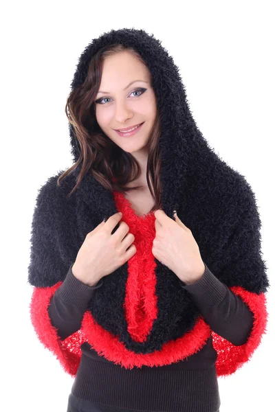 Jovem mulher com poncho vermelho e preto — Fotografia de Stock