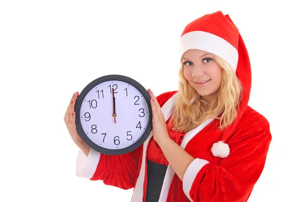 Menina com chapéu de santa segurando relógio — Fotografia de Stock