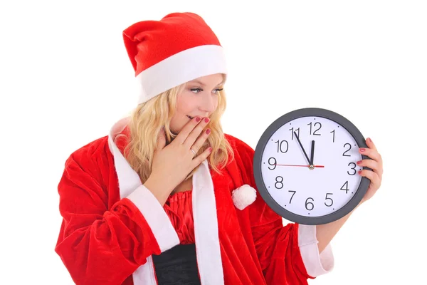 Menina com chapéu de santa segurando relógio — Fotografia de Stock