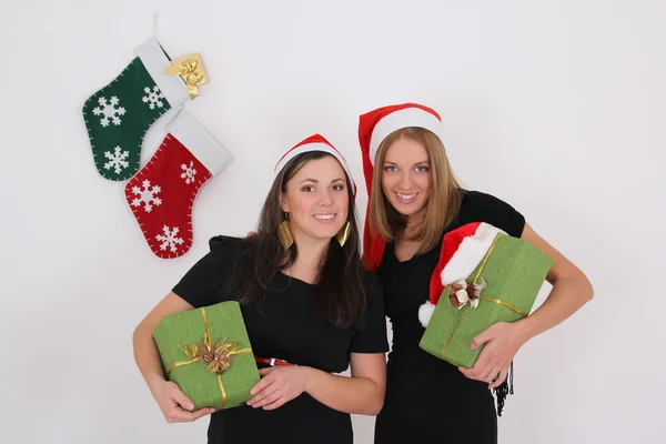 Two beautiful girls with presents — Stock Photo, Image