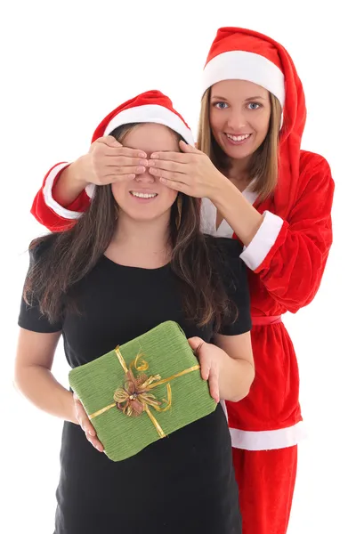 Happy santa closes girls eyes — Stock Photo, Image