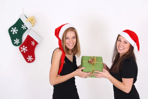 Happy young girls with present — Stock Photo, Image