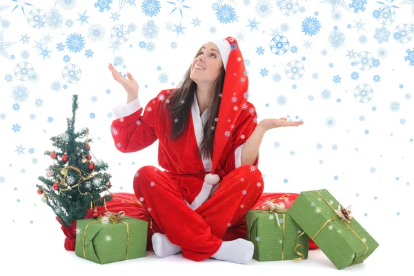 Garota feliz na fantasia de Papai Noel com neve — Fotografia de Stock