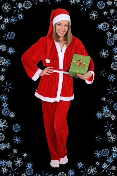 Hermosa chica en traje de santa cláusula con regalo — Foto de Stock