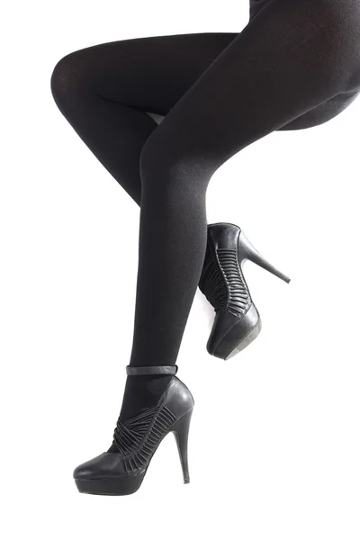 Gyönyörű női lábak fekete harisnyában — Stock Fotó