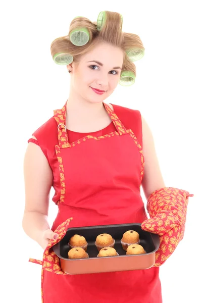 Hemmafru med locktänger och muffins — Stockfoto