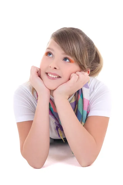 Beautiful teenage girl lying over white — Stock Photo, Image