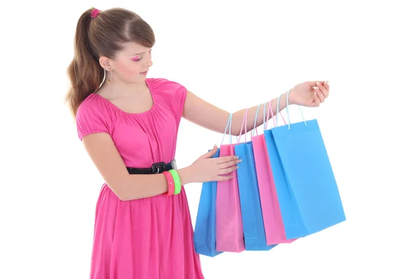 Bella ragazza in vestito rosa dopo lo shopping sopra bianco — Foto Stock