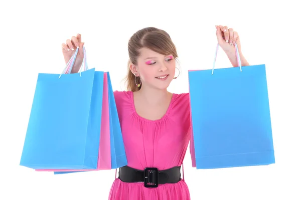 Foto di ragazza adolescente felice in rosa con borse della spesa — Foto Stock