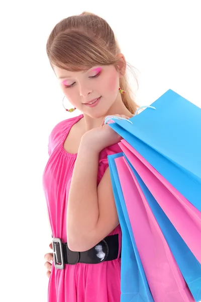 Portret van tienermeisje met shopping tassen — Stockfoto