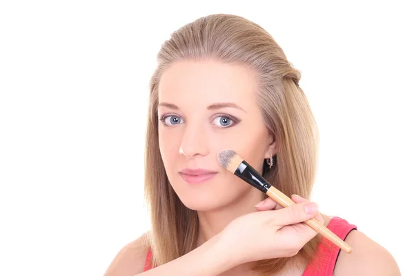 Junge Frau mit Make-up Pinsel weiß — Stockfoto