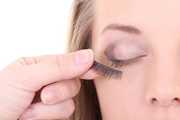 Young woman with artificial eyelashes — Stock Photo, Image