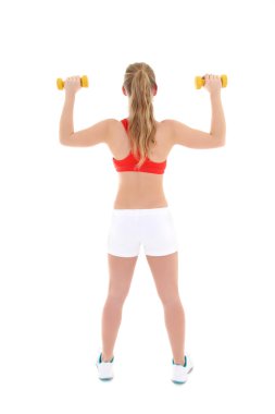 beautiful sporty woman with dumbbells over white