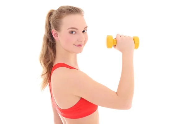 Beautiful woman with dumbbell over white — Stockfoto