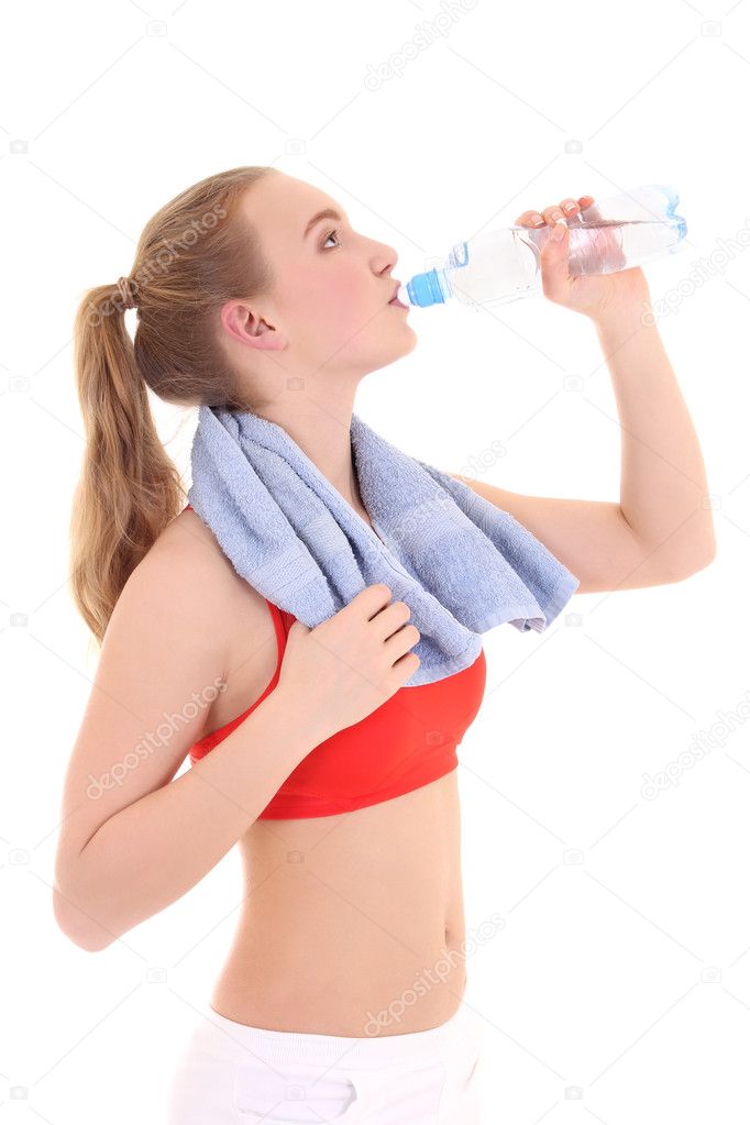 beautiful sporty woman drinking water
