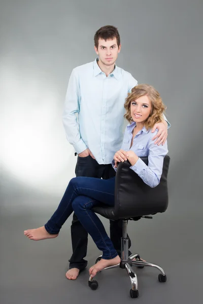 Sitting woman with her boyfriend — Stock Photo, Image