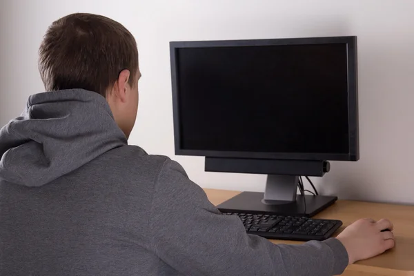 Teenager playing a video game — Stock Photo, Image