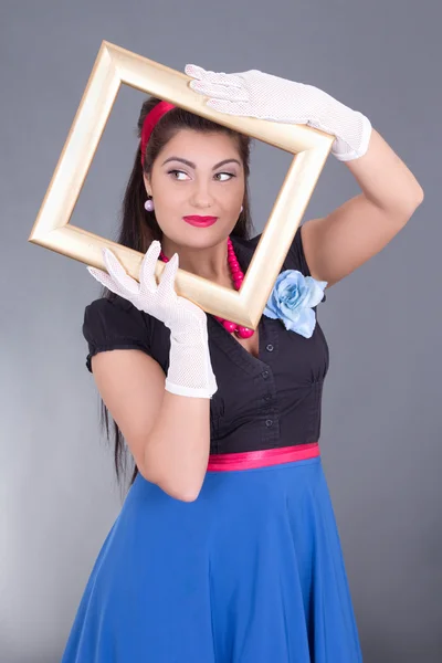 Pretty pinup girl with a frame around her face — Stock Photo, Image