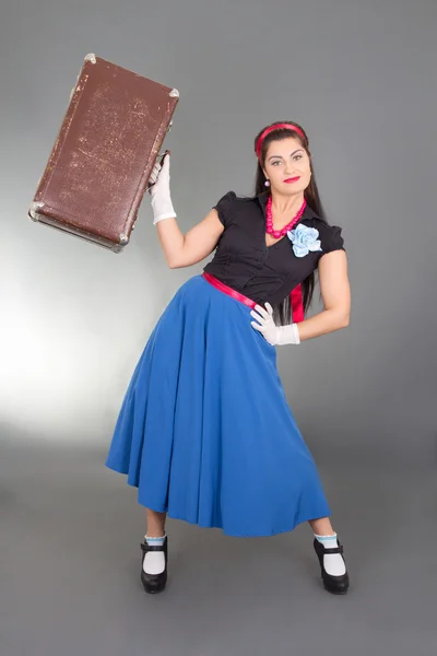Attractive pinup girl with retro suitcase — Stock Photo, Image