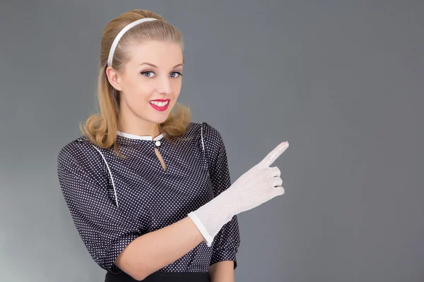 Young beautiful pinup girl showing anything — Stock Photo, Image