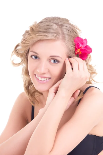 Portrait of young young beautiful woman with flower in her hair — Stock Photo, Image