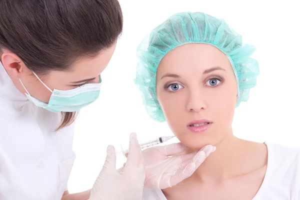 Kobieta lekarz daje zastrzyk na twarz młodej kobiety — Zdjęcie stockowe