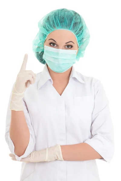 Retrato de joven médico en máscara y casquillo — Foto de Stock