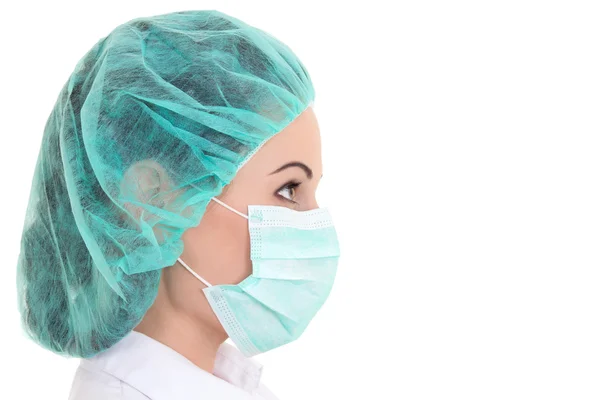 Close up portrait of young female doctor in mask over white — Stock Photo, Image