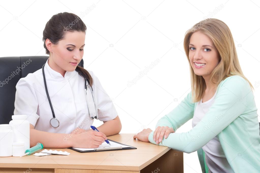 female doctor and happy patient in clinic