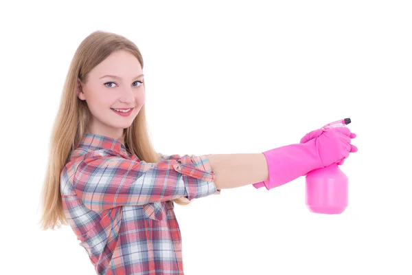 Pembe eldivenleri izole üzerinde sprey ile genç gülümseyen kadın — Stok fotoğraf