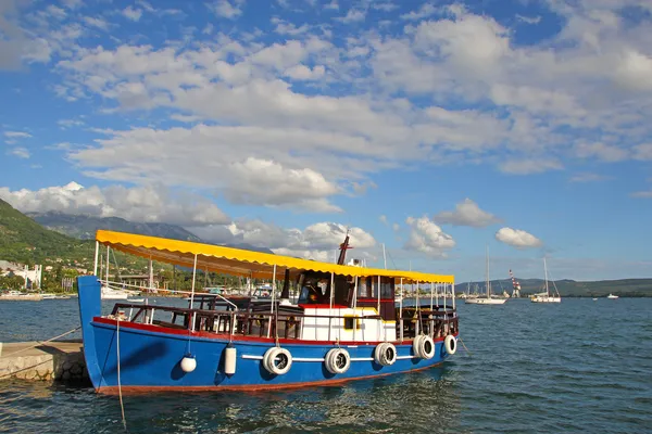 Colorful water bus in harbor of Tivat — Stock Photo, Image