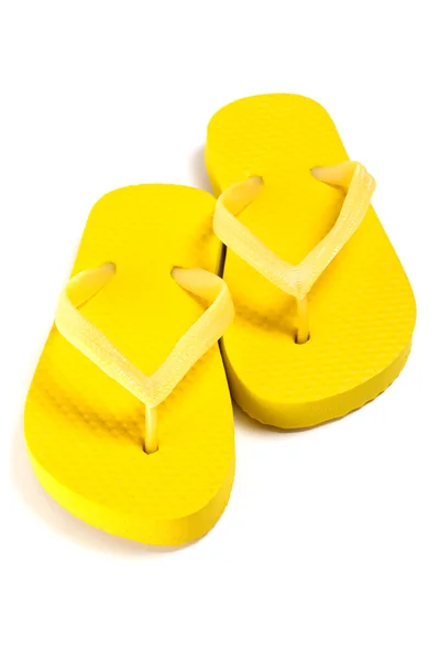 Yellow summer flip flop shoes over white — Stok Foto