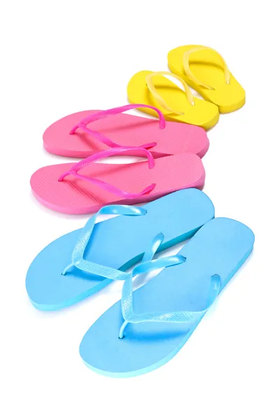 Assortment of rubber flip flops in multiple colors — Stock Photo, Image