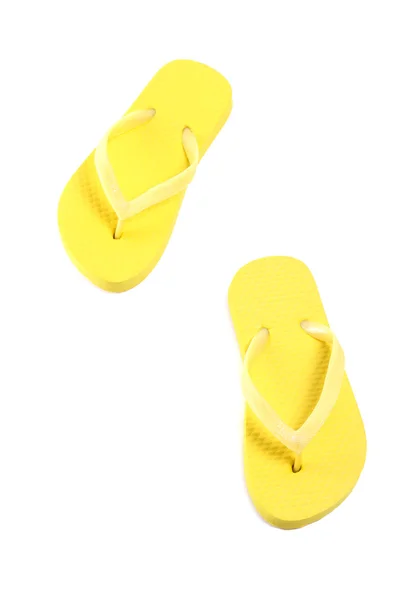 Foto van gele flip flops geïsoleerd op wit — Stockfoto