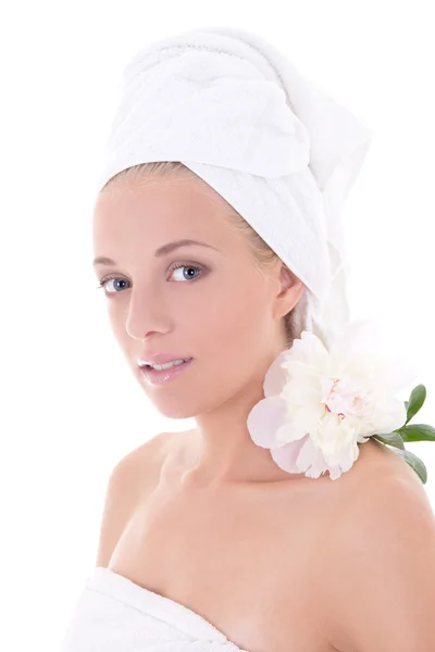 Young woman with towel on head and flower isolated over white ba — Stock Photo, Image