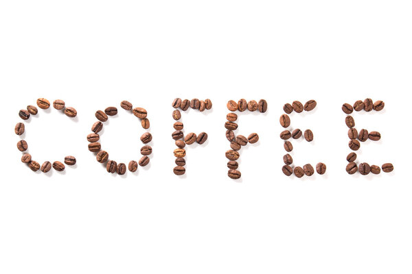 word coffee, roasted beans over white background