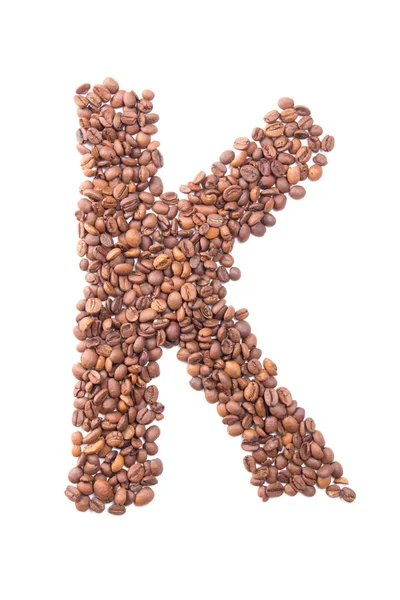 Letter K, alphabet from coffee beans on white background — Stock Photo, Image